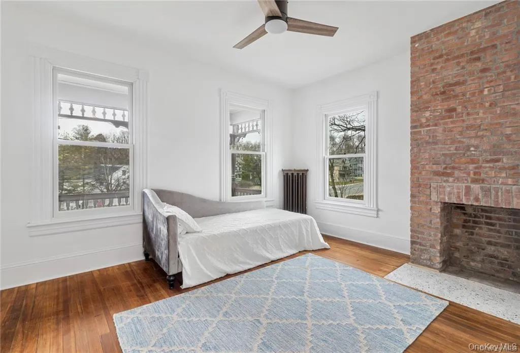 Main Bedroom with Brick Fireplace Area Main Bedroom with Brick Fireplace Area