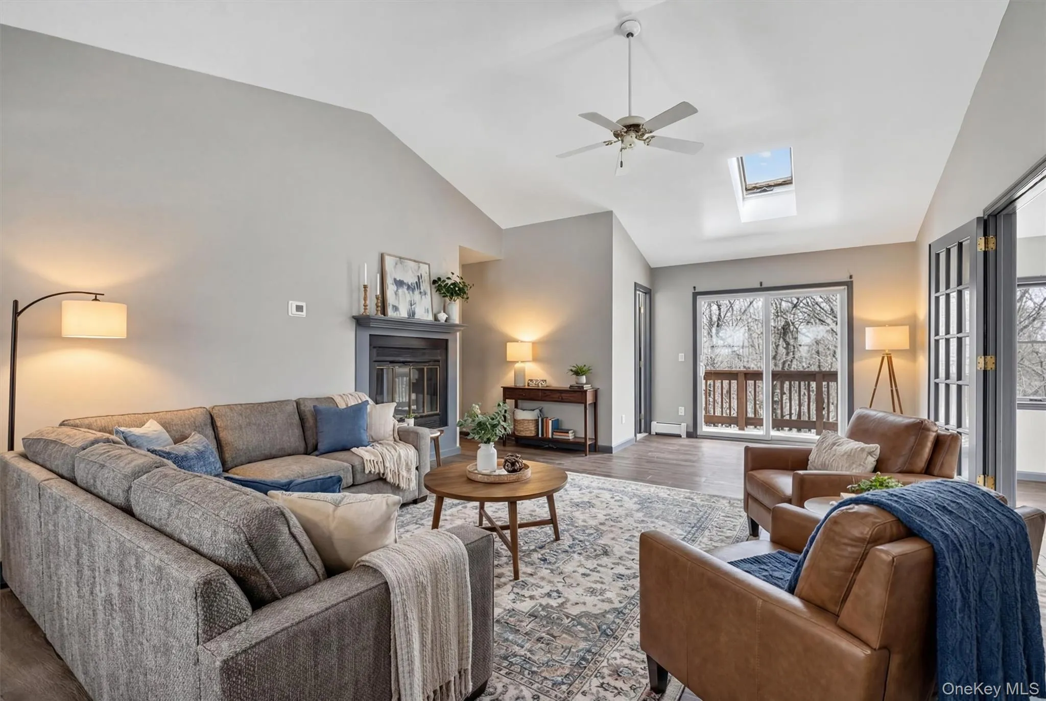 Primary Suite sitting room. A fireplace and Juliette balcony make this a soothing place to unwindVirtually Staged Primary Suite sitting room. A fireplace and Juliette balcony make this a soothing place to unwindVirtually Staged
