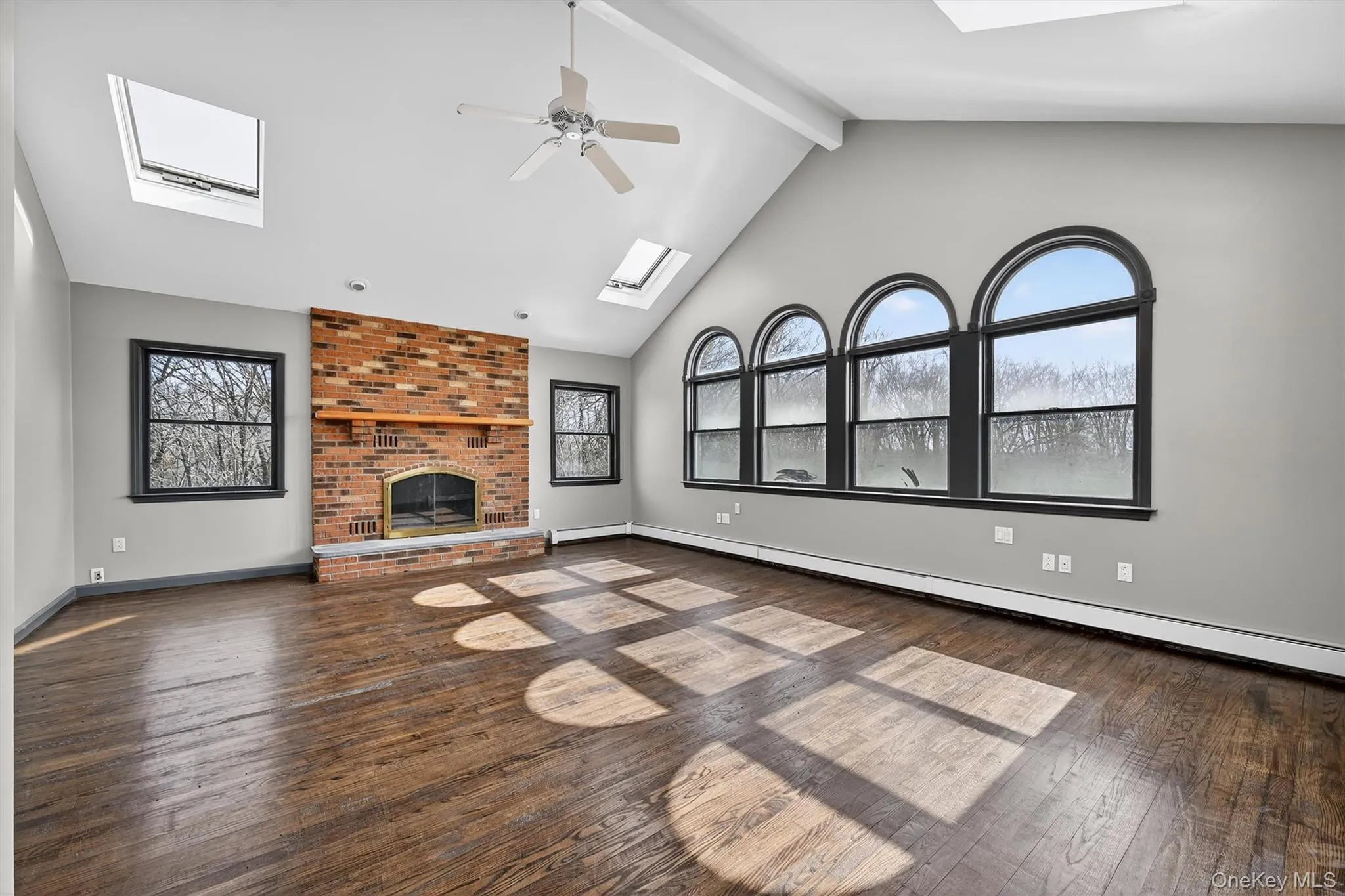 Palladian windows are used throughout the property for a cohesive look. Palladian windows are used throughout the property for a cohesive look.