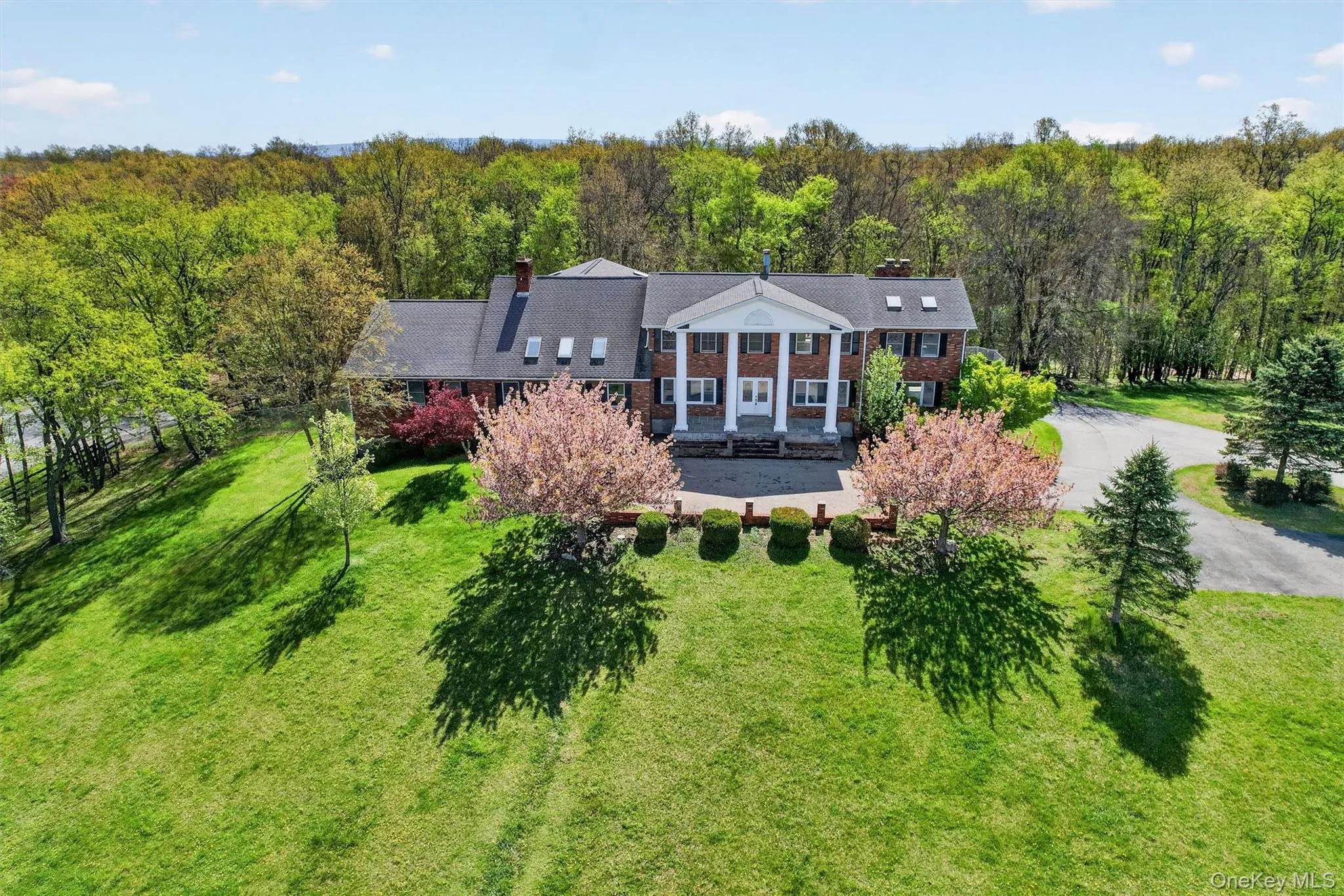 Gracefully sitting on a knoll, this home makes a statement Gracefully sitting on a knoll, this home makes a statement