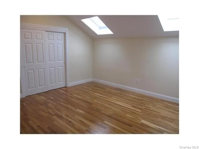 Large loft which most use as a second bedroom, with 2 skylights, a double closet, and a door to private attic with lots of private storage space Large loft which most use as a second bedroom, with 2 skylights, a double closet, and a door to private attic with lots of private storage space