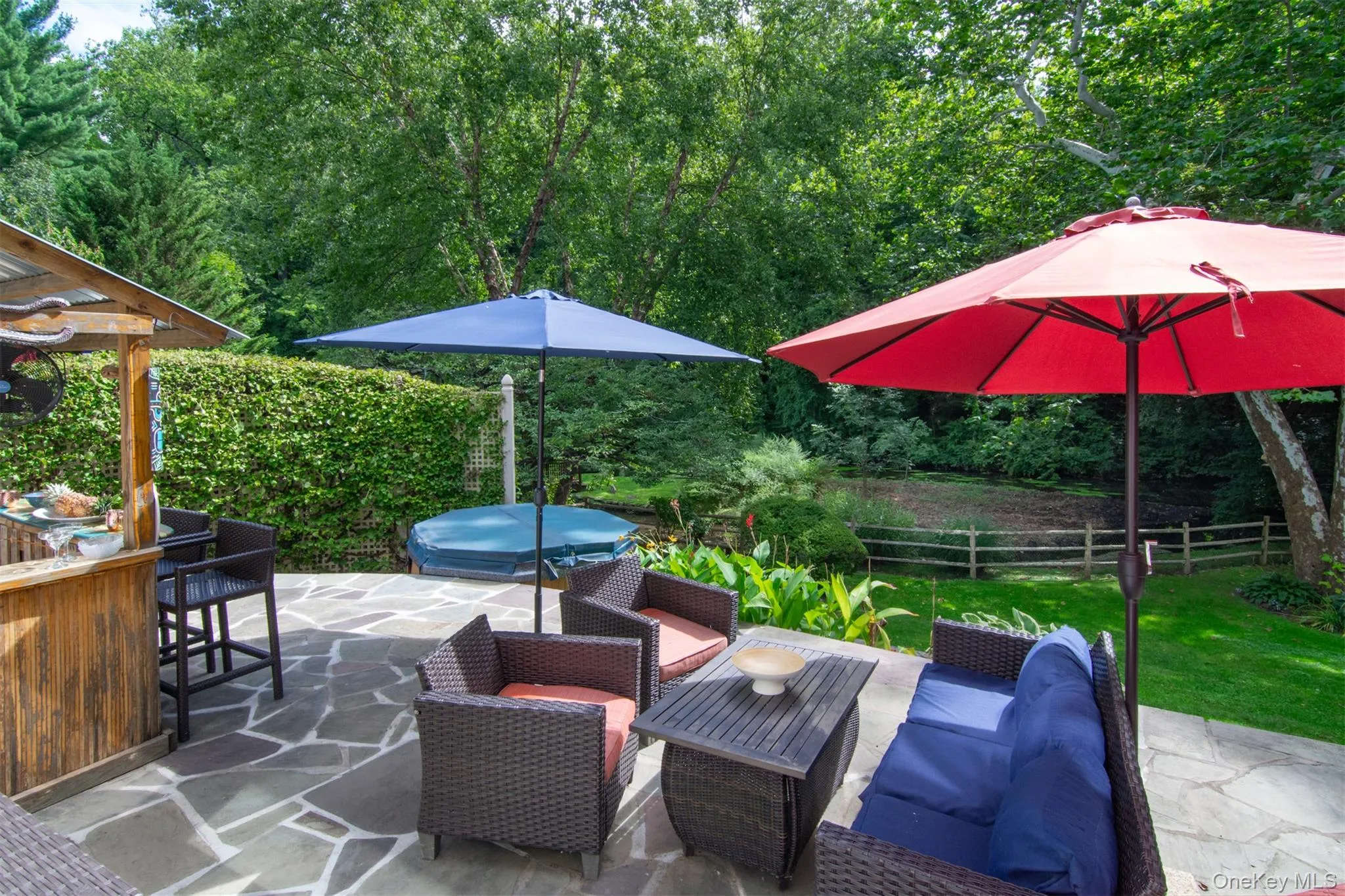 The stone patio provides a peaceful escape surrounded by fresh air and treetop views. The stone patio provides a peaceful escape surrounded by fresh air and treetop views.