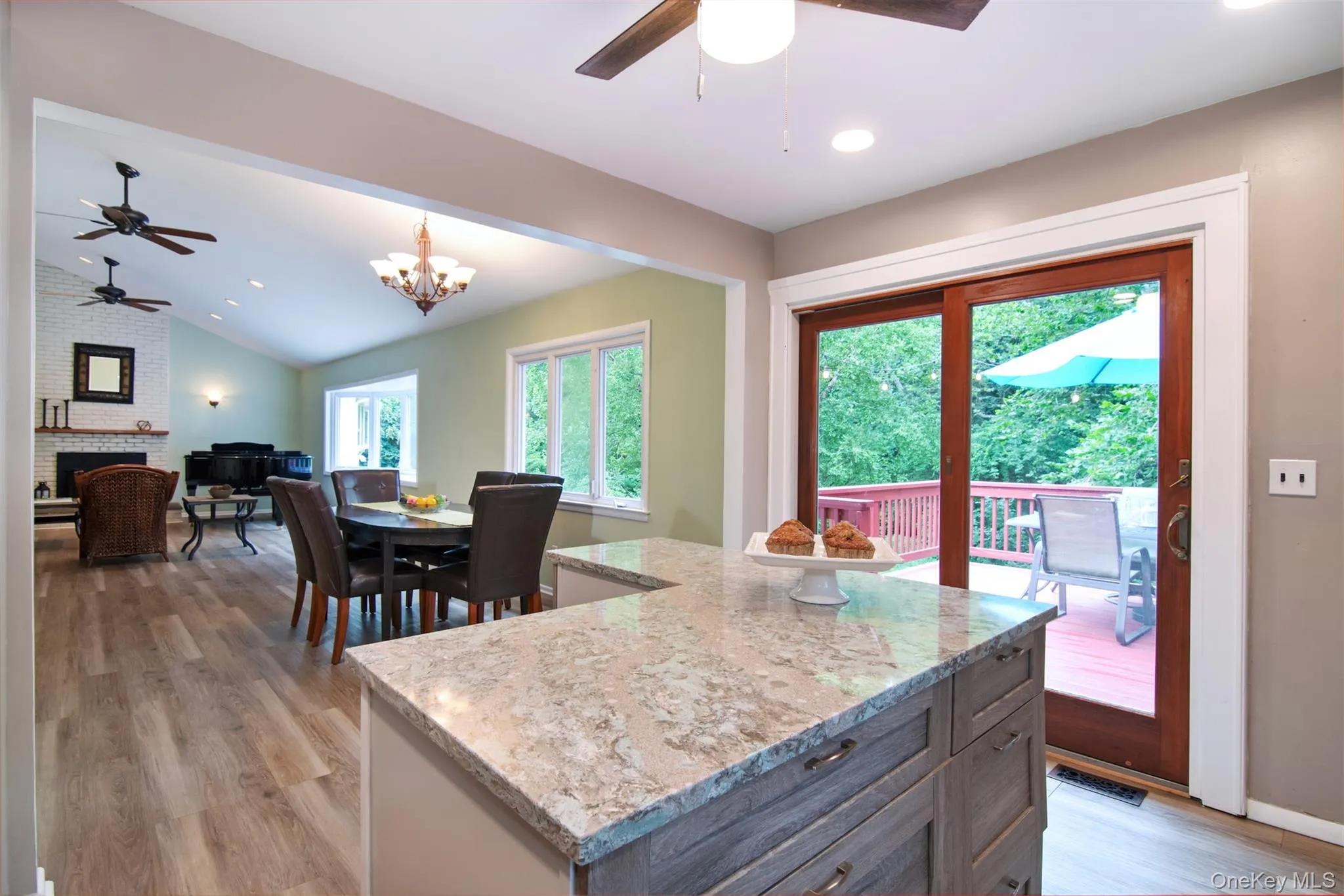 Easy access to the back patio for morning coffee from the kitchen. Easy access to the back patio for morning coffee from the kitchen.