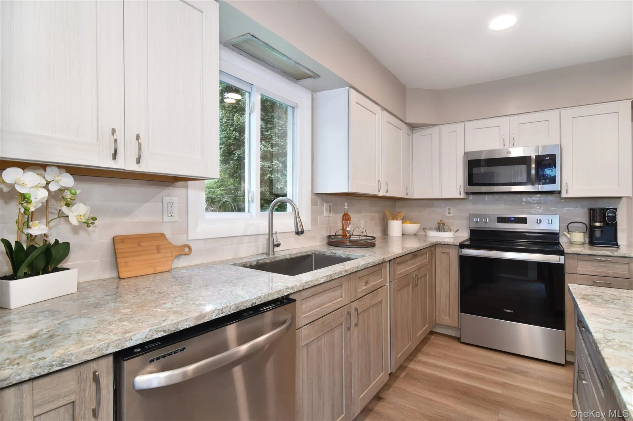 The kitchen is an inviting space where family and friends naturally gather. The kitchen is an inviting space where family and friends naturally gather.