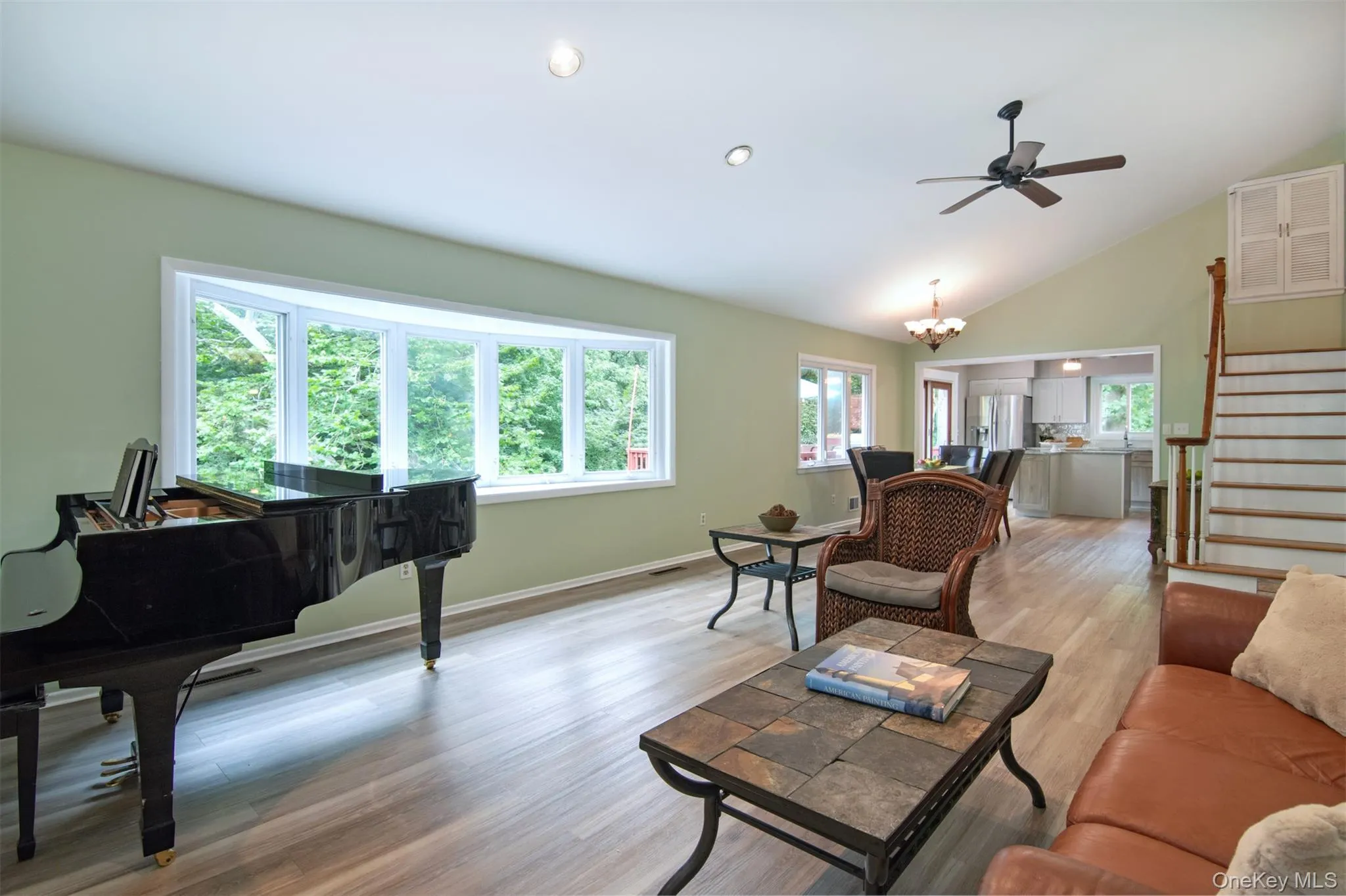 This entire level of the home is enveloped in light, space, and nature. Vaulted ceilings projects a welcoming quality that is difficult to resist! Easy-care luxury vinyl flooring, with hardwood flooring beneath. This entire level of the home is enveloped in light, space, and nature. Vaulted ceilings projects a welcoming quality that is difficult to resist! Easy-care luxury vinyl flooring, with hardwood flooring beneath.