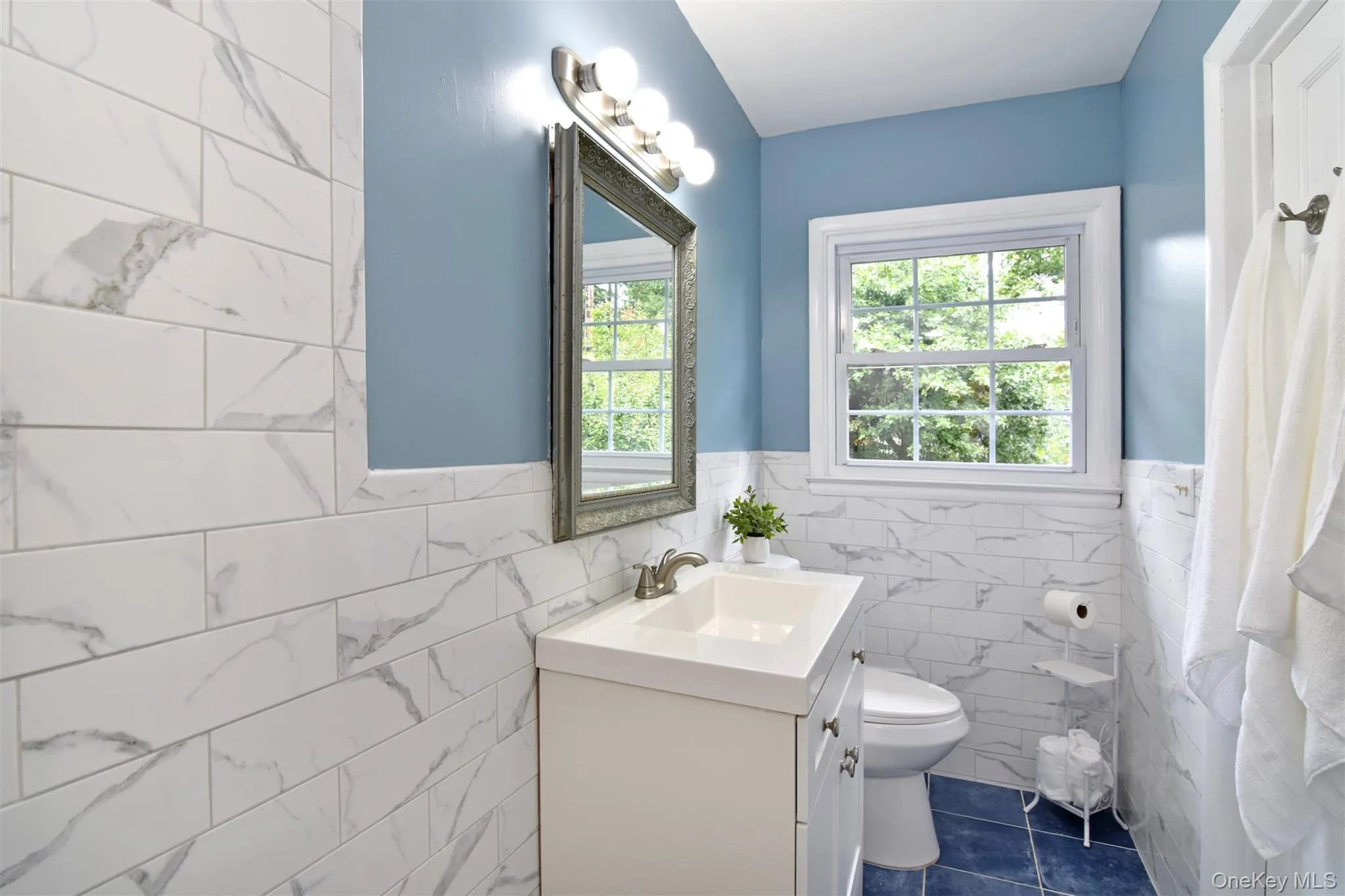 A windowed ensuite bath has classic styling with every comfort. A windowed ensuite bath has classic styling with every comfort.