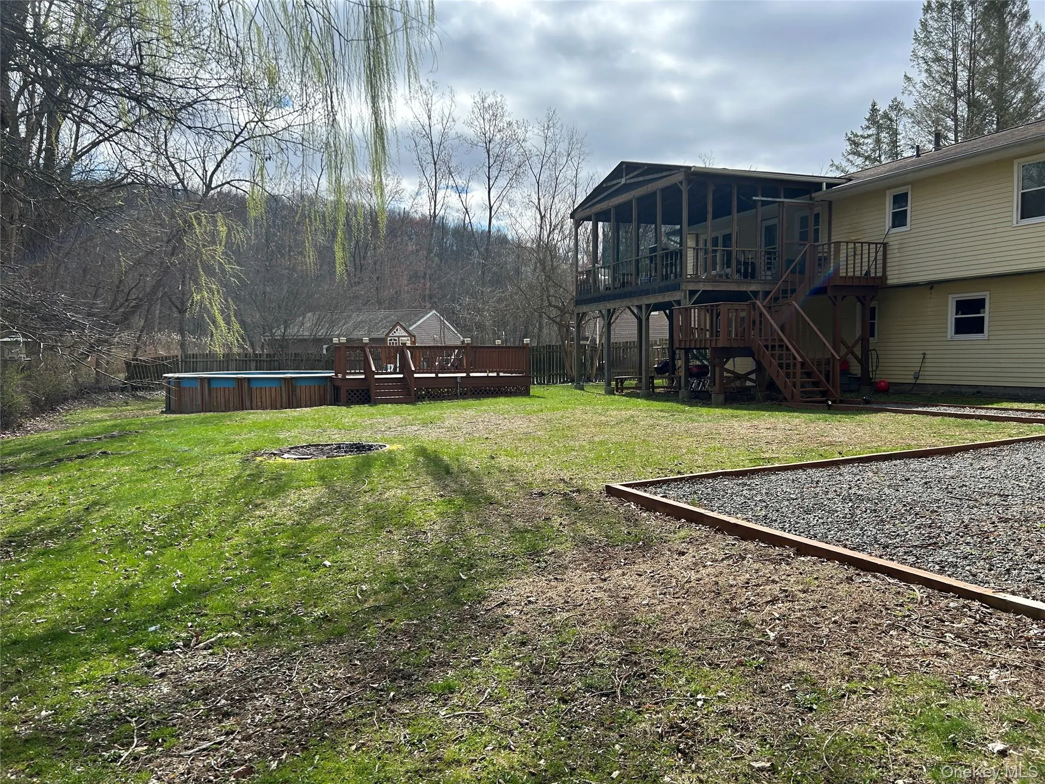 Large fenced private with above ground pool and screened-in deck. Large fenced private with above ground pool and screened-in deck.