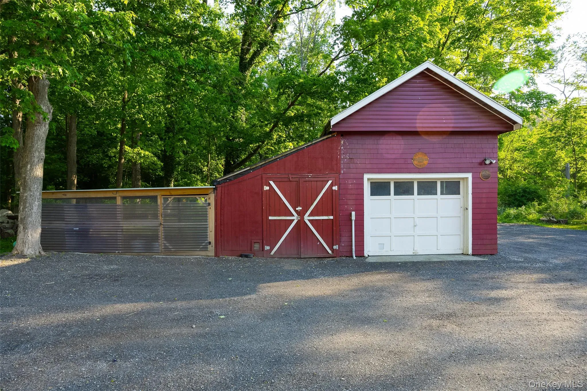 Chicken coop to the left of the garage Chicken coop to the left of the garage