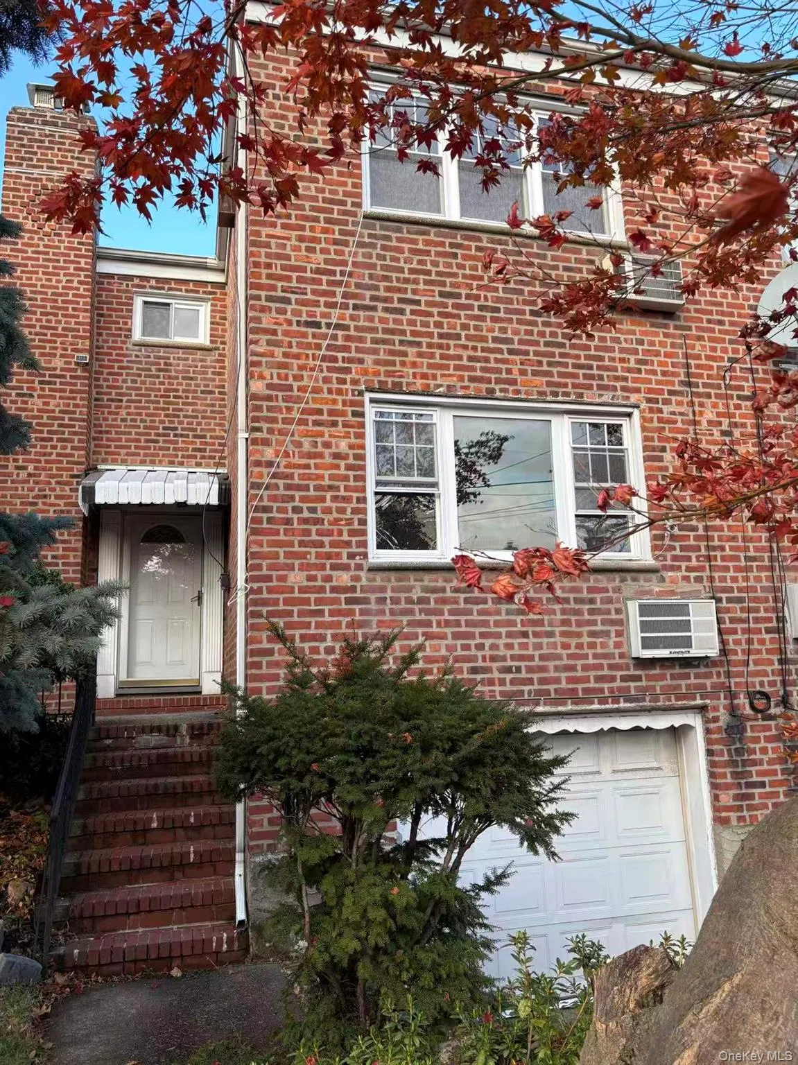 Traditional-style home with brick siding Traditional-style home with brick siding