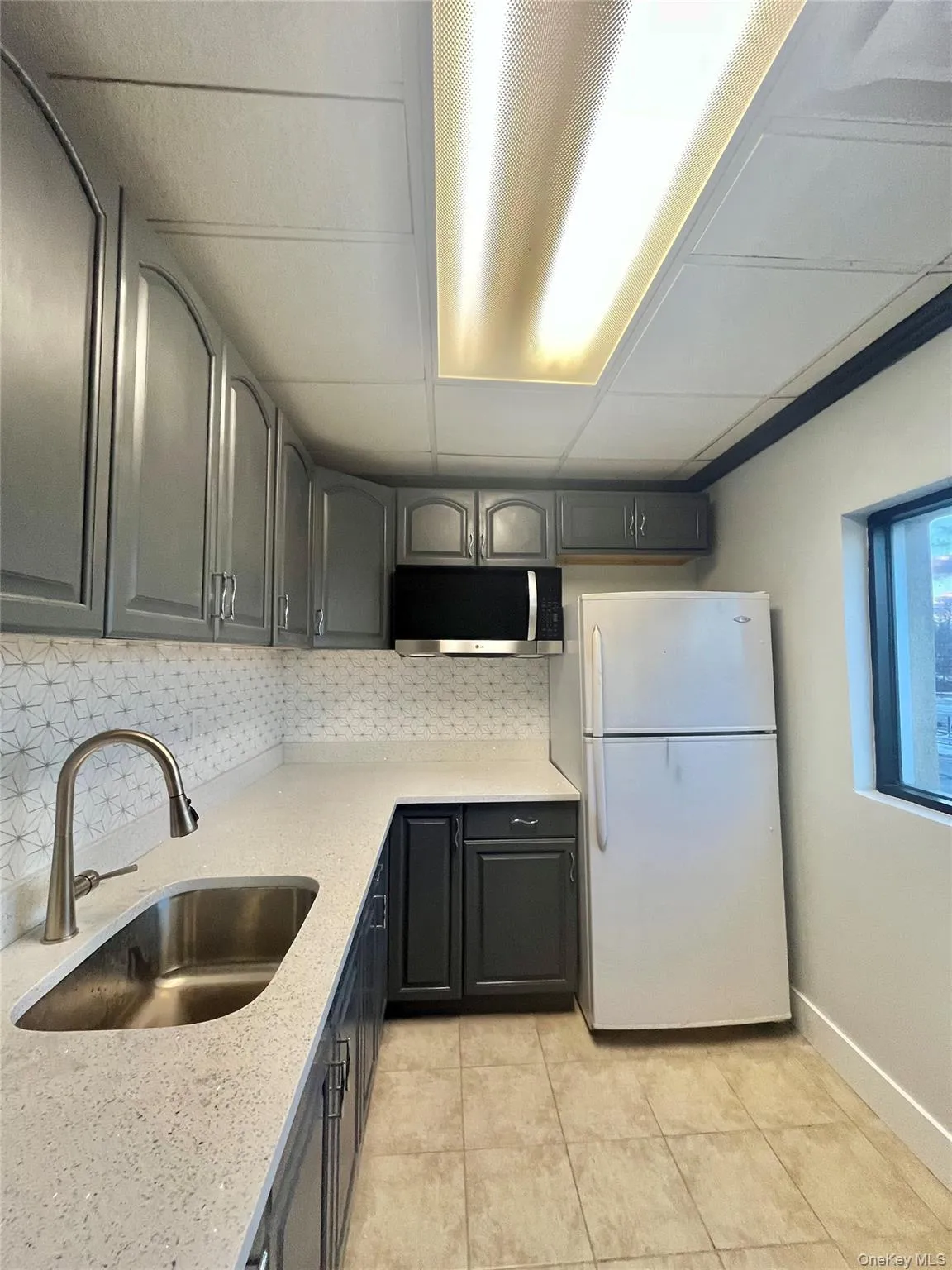 Kitchen with a eating bar Kitchen with a eating bar