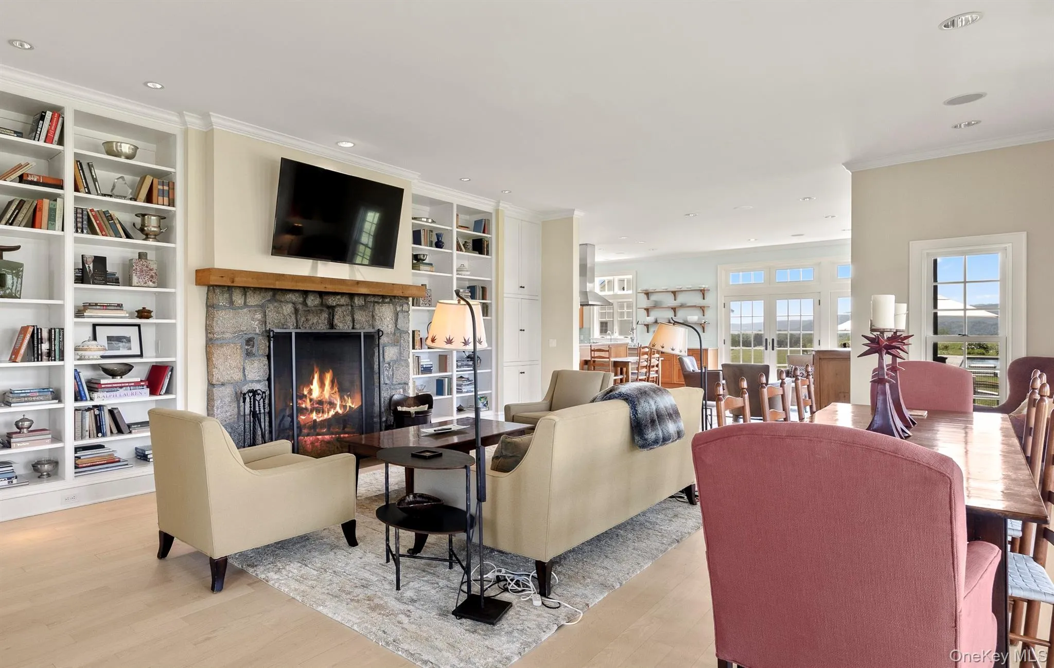 The Open Floor Plan with Large Fireplace is Inviting and Perfect for Entertaining The Open Floor Plan with Large Fireplace is Inviting and Perfect for Entertaining