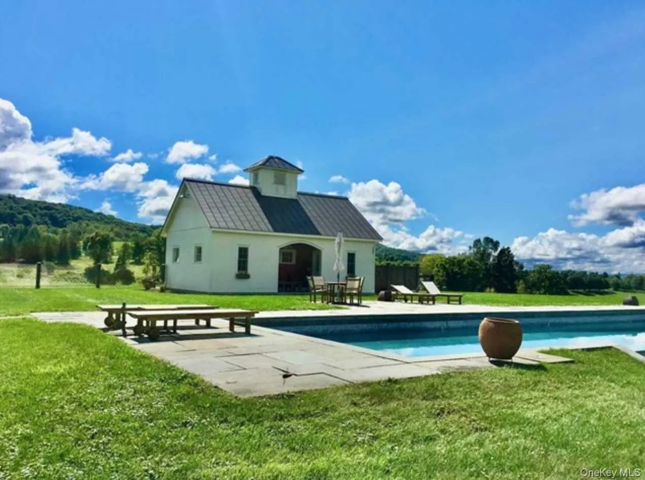 Enjoy Your Days Swimming on Top of the World in the Oversized In-Ground Gunite Pool Enjoy Your Days Swimming on Top of the World in the Oversized In-Ground Gunite Pool