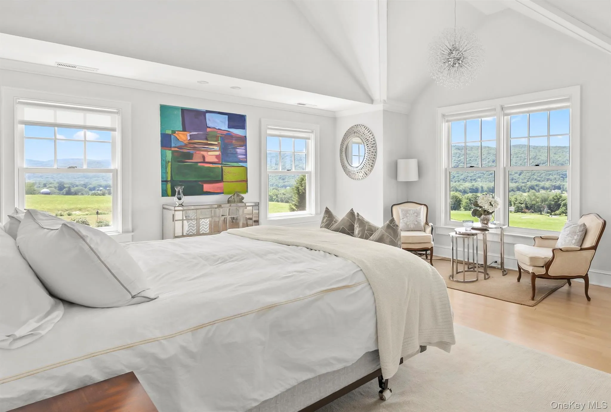 The Large Primary Bedroom Suite Enjoys Abundant Light, Vaulted Ceiling and Spectacular Views The Large Primary Bedroom Suite Enjoys Abundant Light, Vaulted Ceiling and Spectacular Views