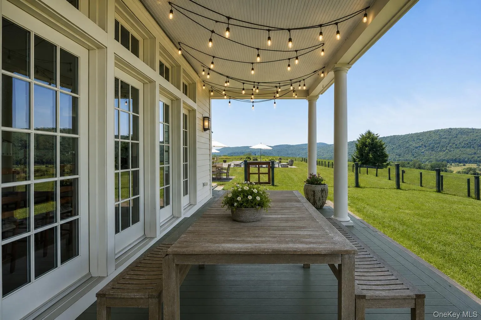 A Stunning West-Facing Front Porch is the Perfect Place to Enjoy Meals or Drinks to Watch the Sun Set. A Stunning West-Facing Front Porch is the Perfect Place to Enjoy Meals or Drinks to Watch the Sun Set.
