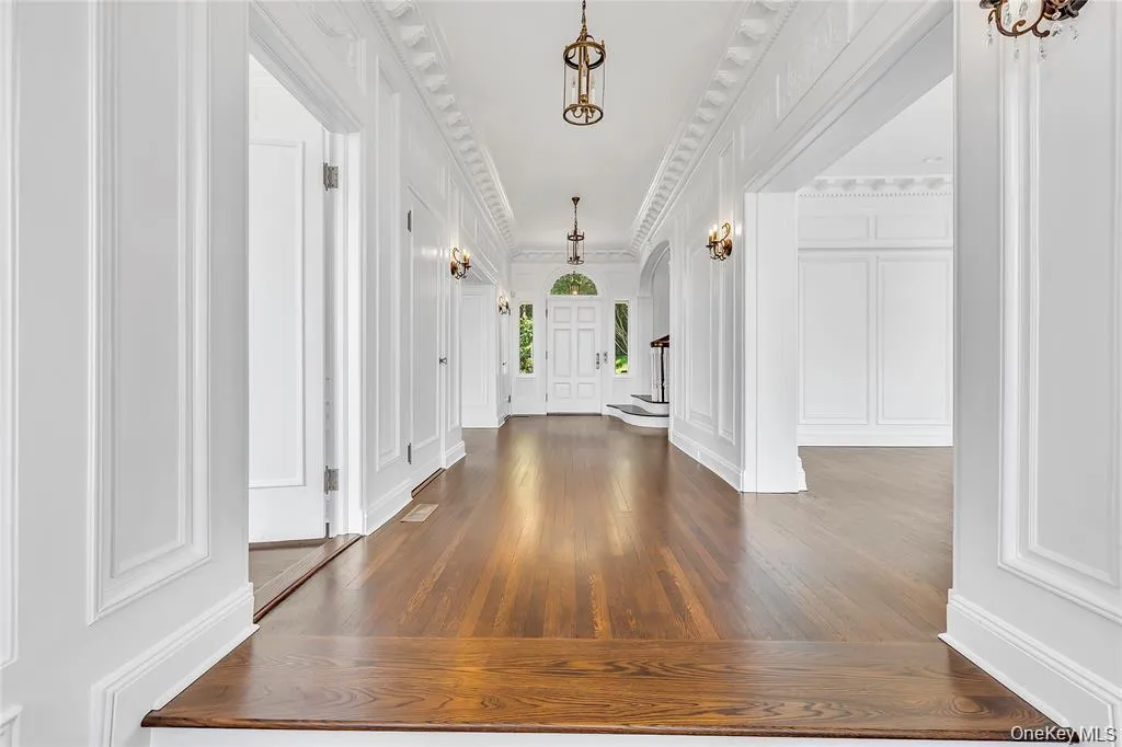 The Front to Back Center Hall Provides a Formal Transition to The Private Rooms that Flank it on Either Side The Front to Back Center Hall Provides a Formal Transition to The Private Rooms that Flank it on Either Side