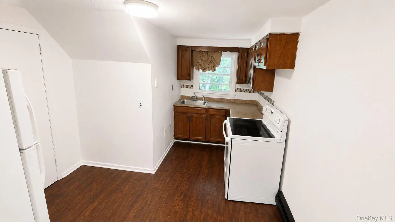 Kitchen with Electric Stove. Kitchen with Electric Stove.