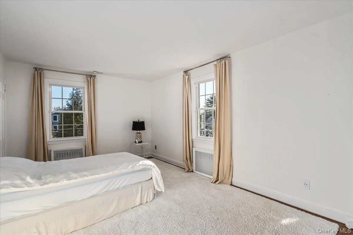 Bright and airy 4th bedroom with hardwood floors. Bright and airy 4th bedroom with hardwood floors.