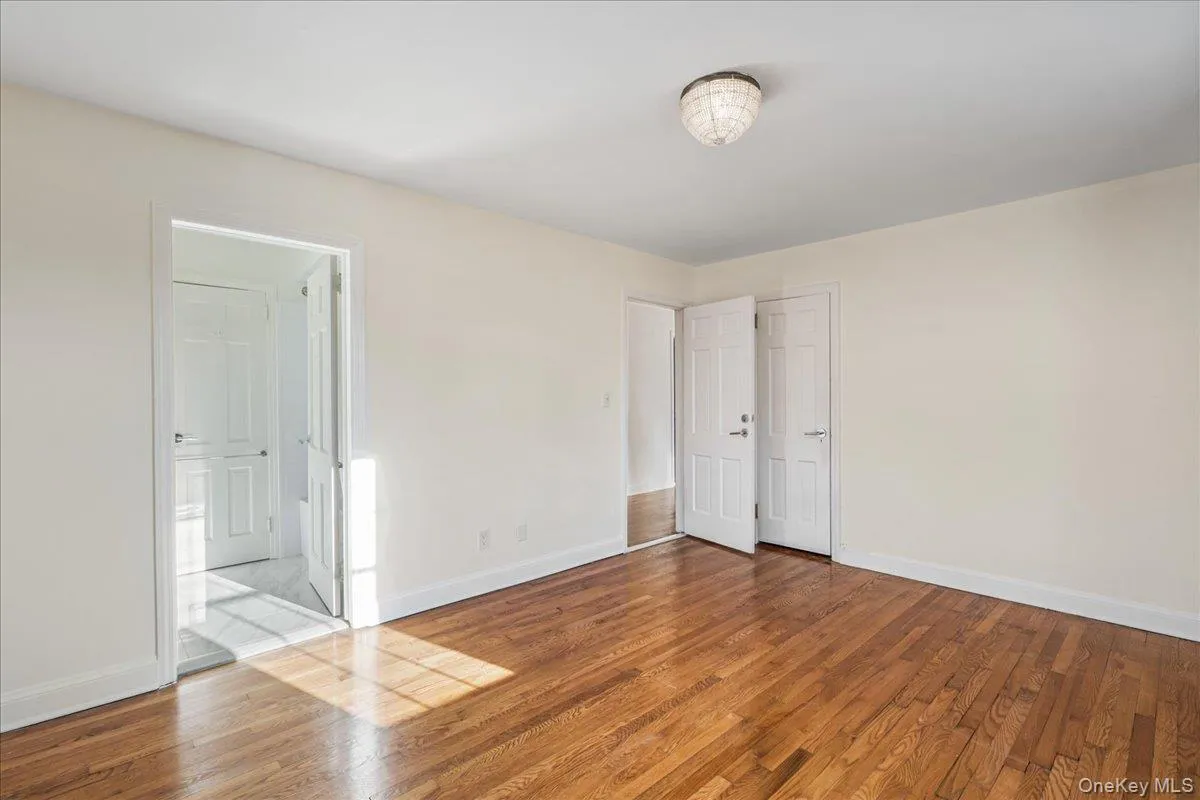 2nd Bedroom with hardwood floors and en suite shared full bath. 2nd Bedroom with hardwood floors and en suite shared full bath.