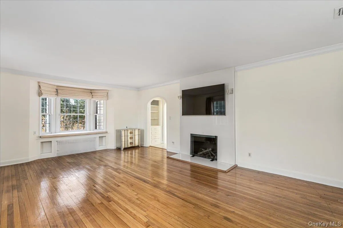 The spacious Living Room with original details. The spacious Living Room with original details.