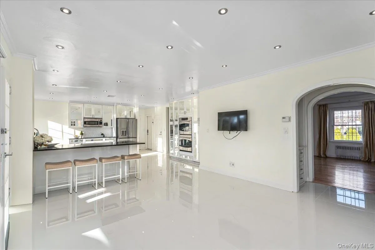 Open concept kitchen with countertop seating. Open concept kitchen with countertop seating.