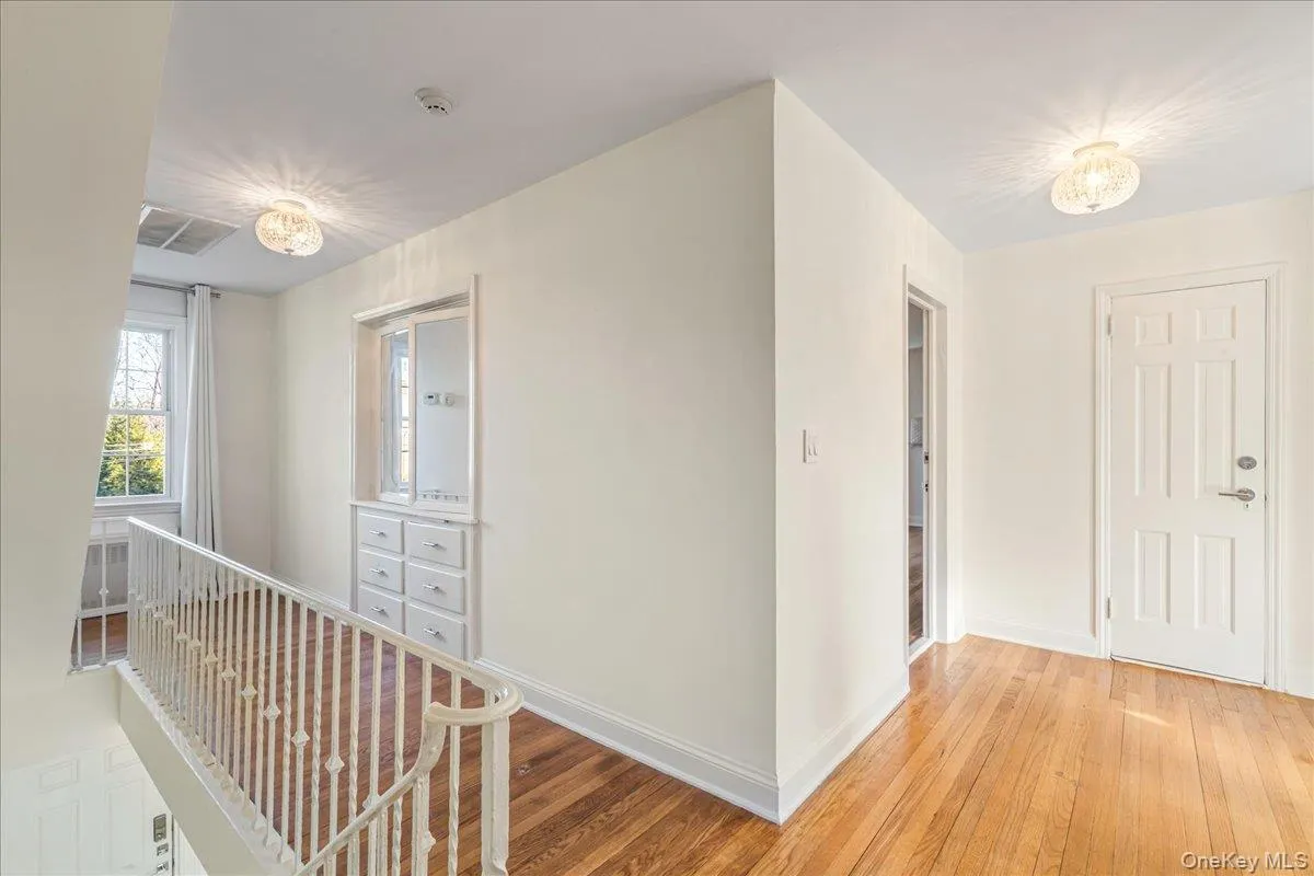 2nd Floor Hall with original built-in linen closet 2nd Floor Hall with original built-in linen closet
