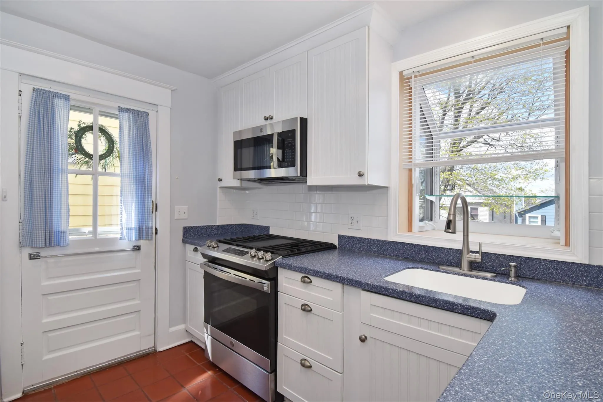 Lovely kitchen with stainless appliances Lovely kitchen with stainless appliances