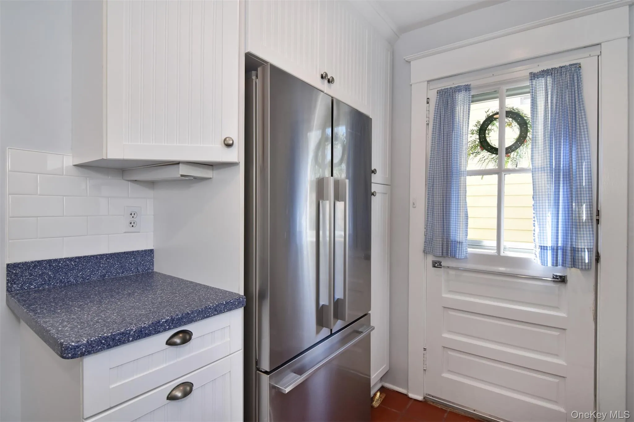 Kitchen door opens to deck Kitchen door opens to deck