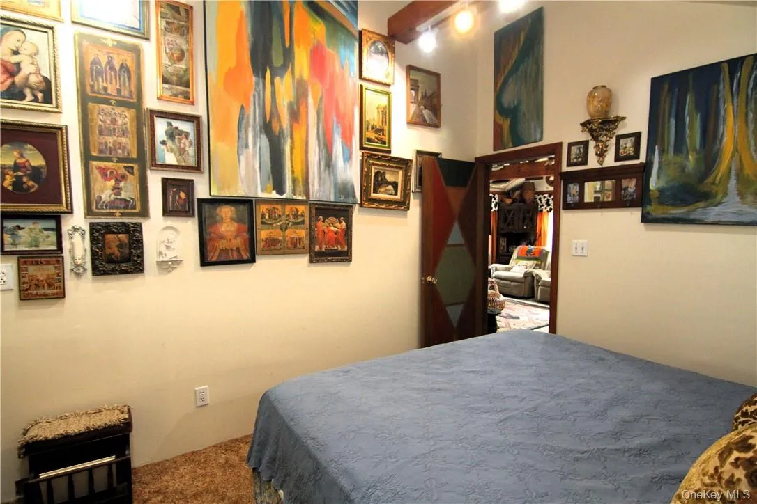 Bedroom featuring carpet flooring Bedroom featuring carpet flooring