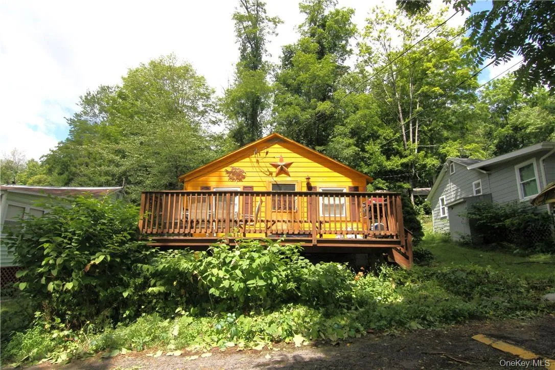 Back of property with a deck Back of property with a deck