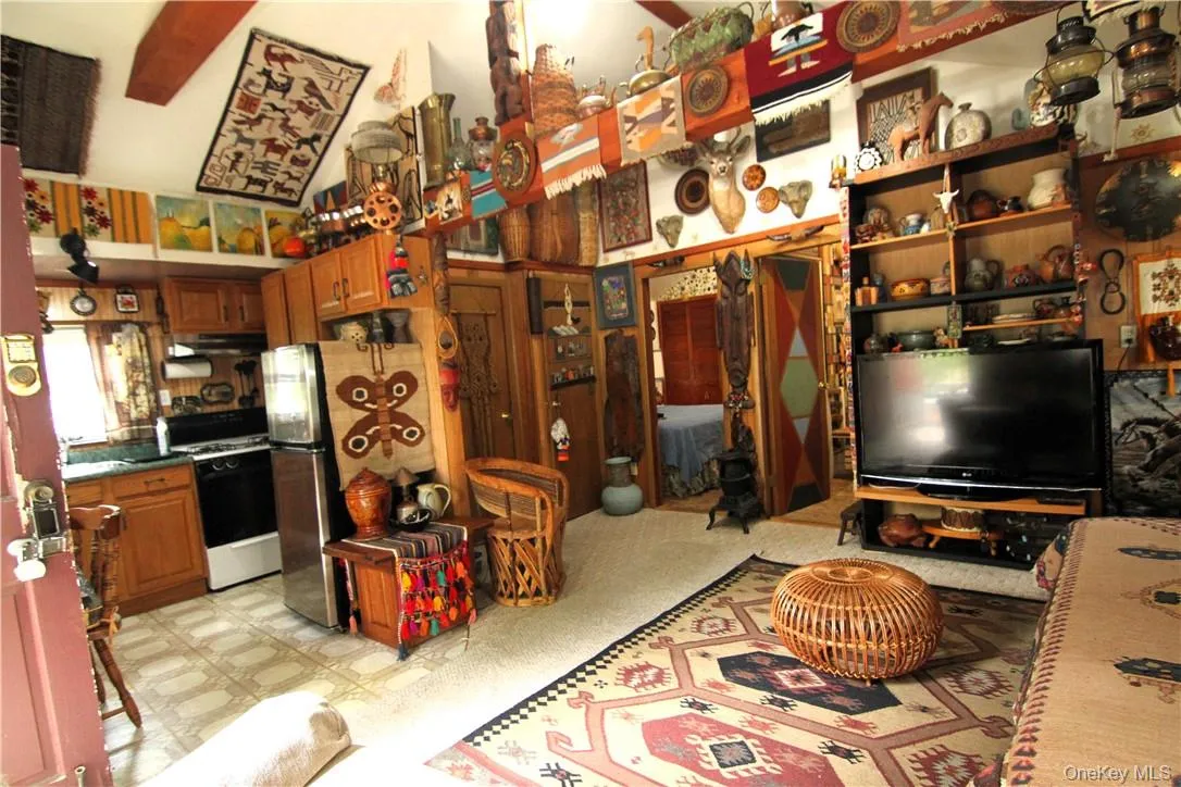 Kitchen with stainless steel fridge and range Kitchen with stainless steel fridge and range