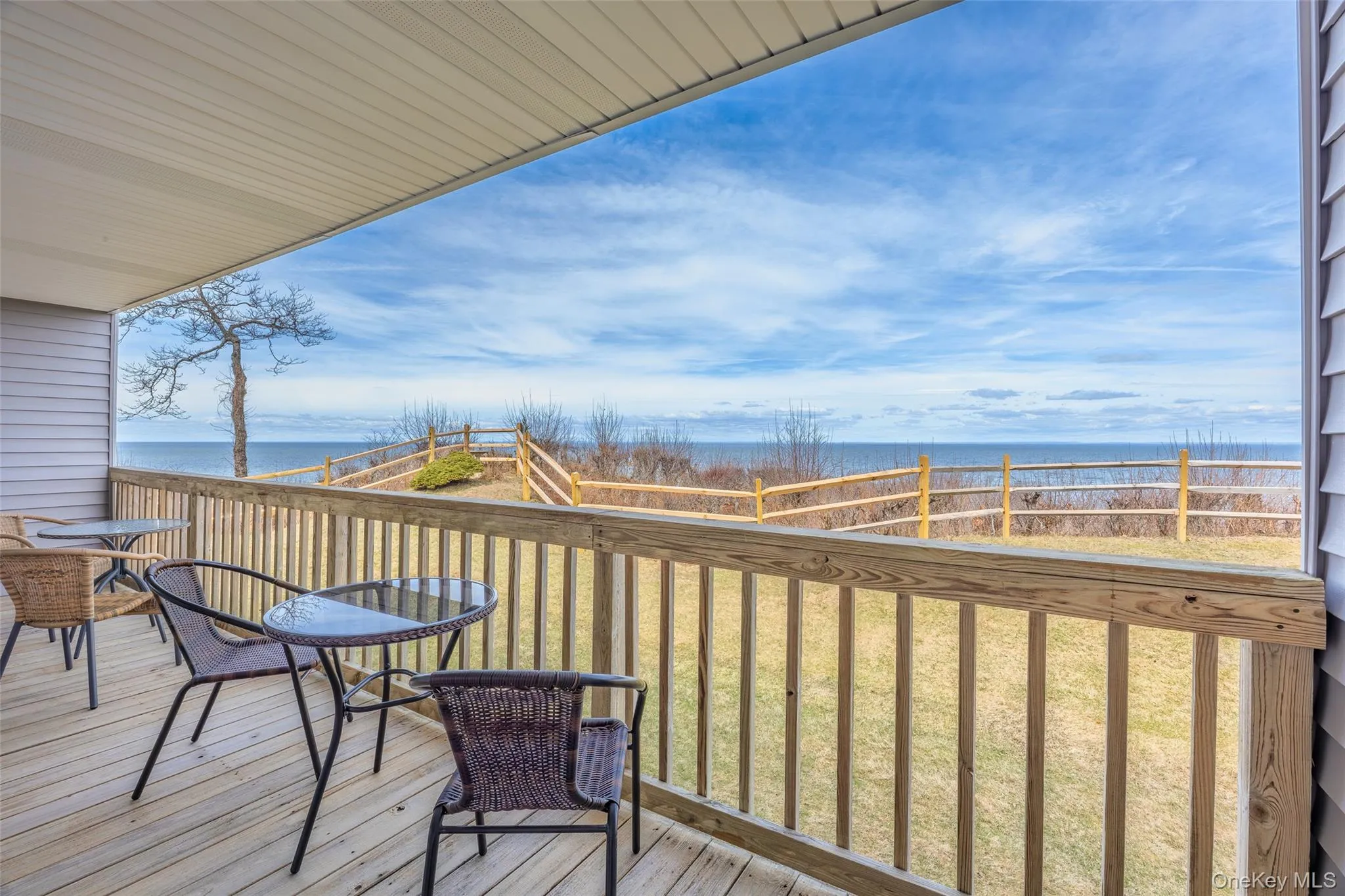 Deck featuring a water view Deck featuring a water view