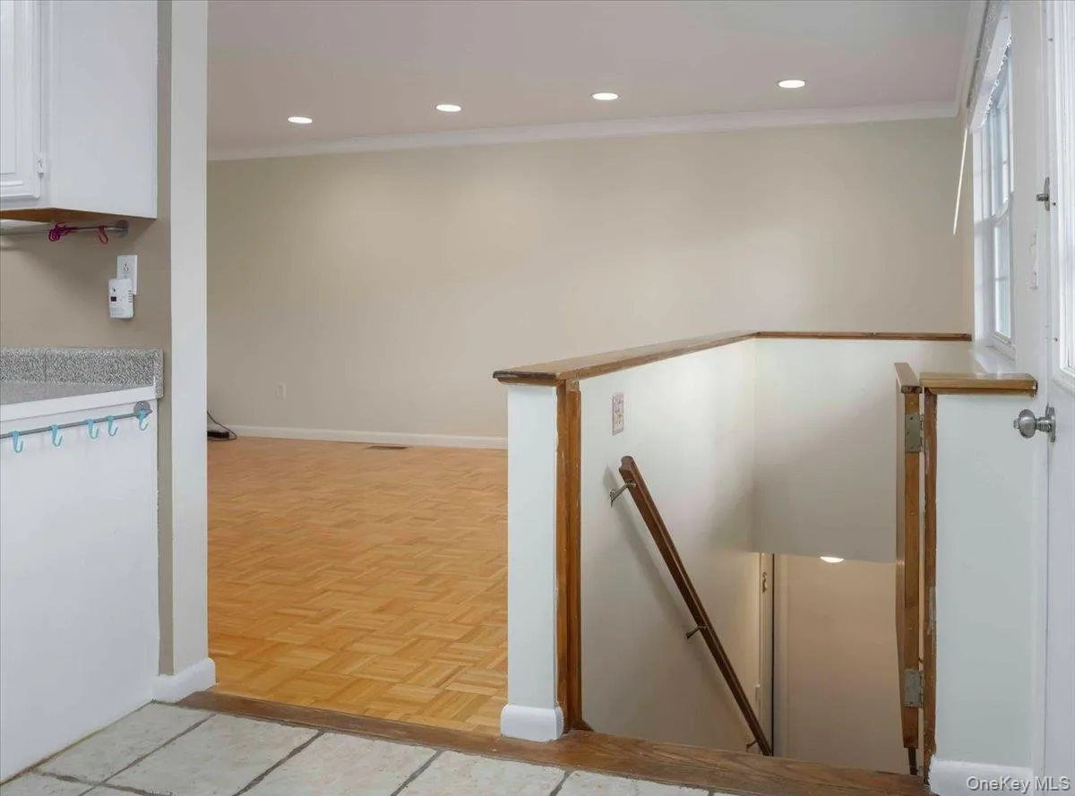 Stairs to lower level basement/storage Stairs to lower level basement/storage