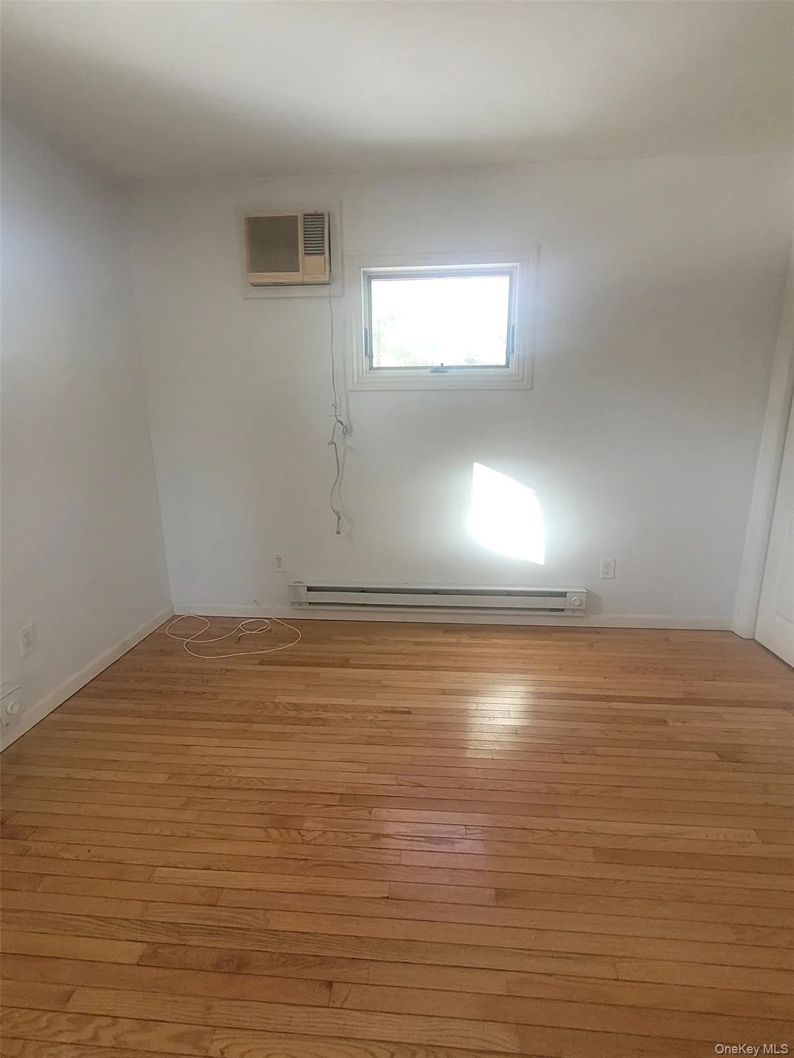 Bedroom with hardwood floors Bedroom with hardwood floors