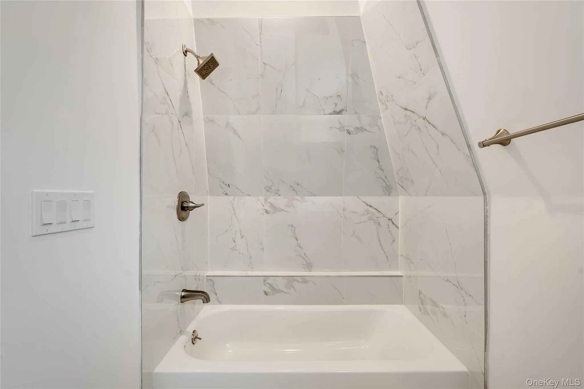 Bathroom featuring tiled shower / bath Bathroom featuring tiled shower / bath