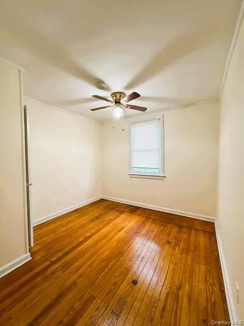 Bedroom Featuring Wood-finish flooring, a ceiling fan with integrated lighting! Bedroom Featuring Wood-finish flooring, a ceiling fan with integrated lighting!