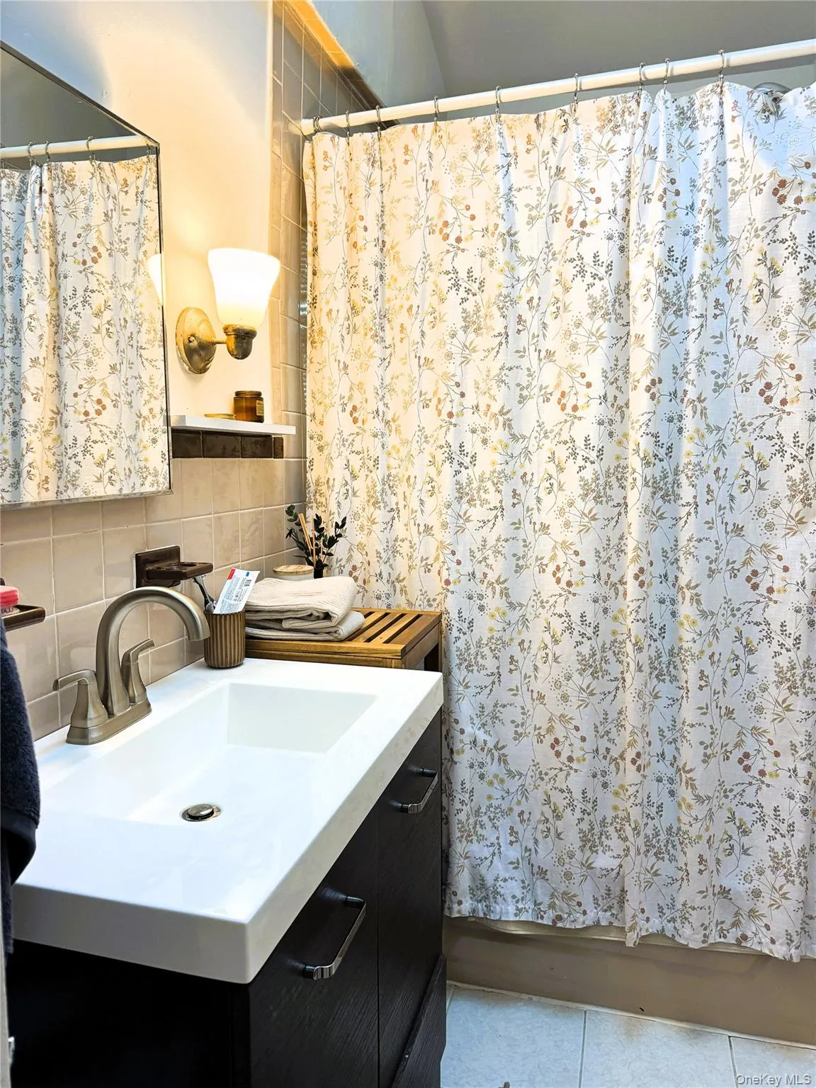 Bathroom includes built in shelves and Linen Closet Bathroom includes built in shelves and Linen Closet