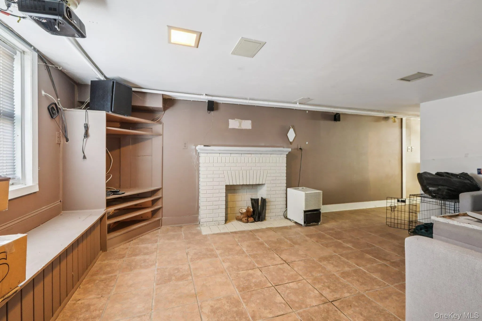 Finished basement with a fireplace and heating unit Finished basement with a fireplace and heating unit