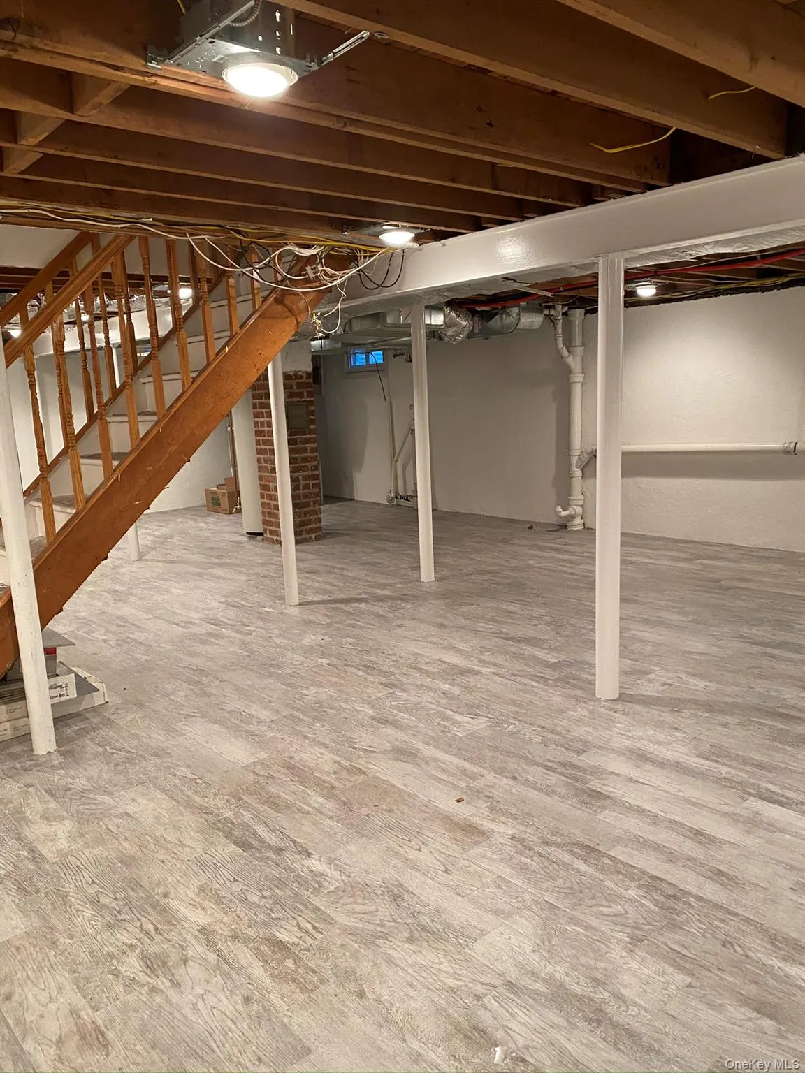 Basement with Finished Flooring Basement with Finished Flooring