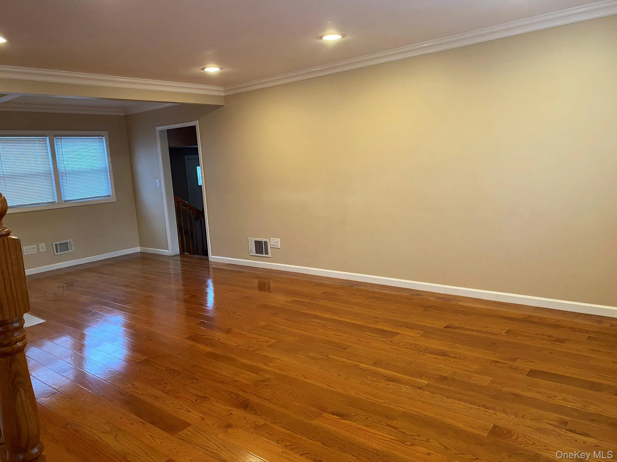 Living /Dining room featuring wood flooring. Living /Dining room featuring wood flooring.