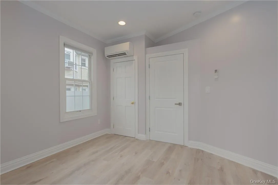 Third bedroom with access to deck. Third bedroom with access to deck.