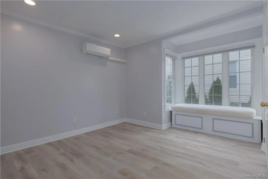 Middle bedroom with bay window and window seat. Middle bedroom with bay window and window seat.
