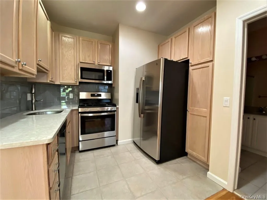 Kitchen designed for everyday living with stainless steel appliances Kitchen designed for everyday living with stainless steel appliances