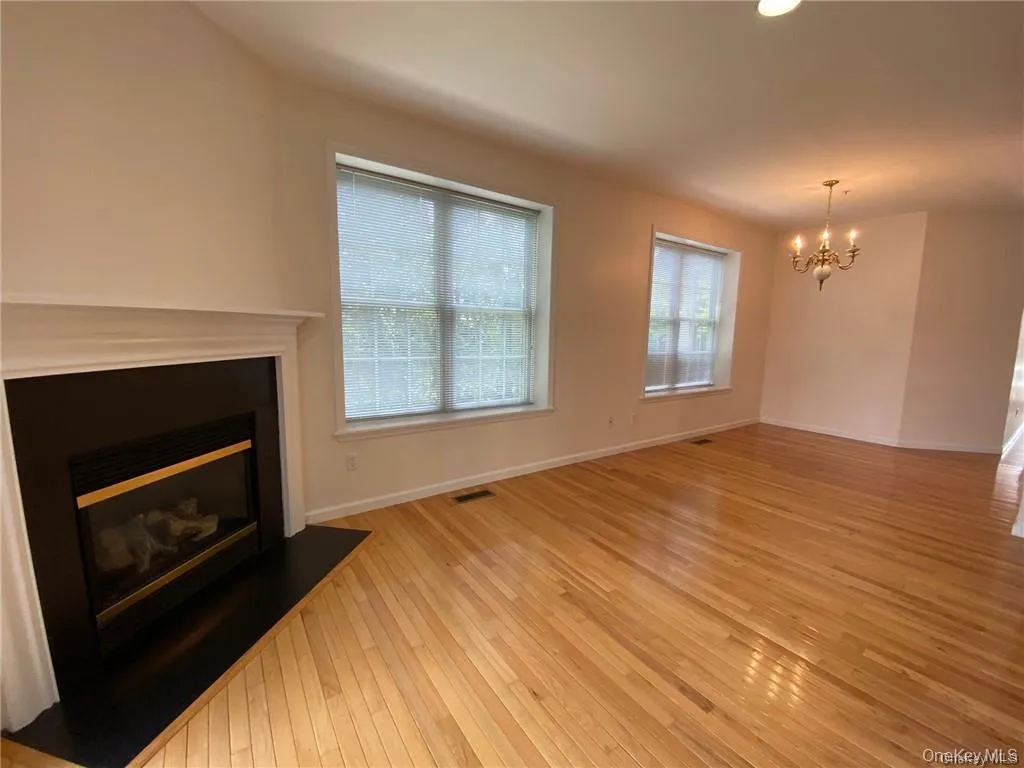 Cozy fireplace creating a warm focal point in the living room Cozy fireplace creating a warm focal point in the living room