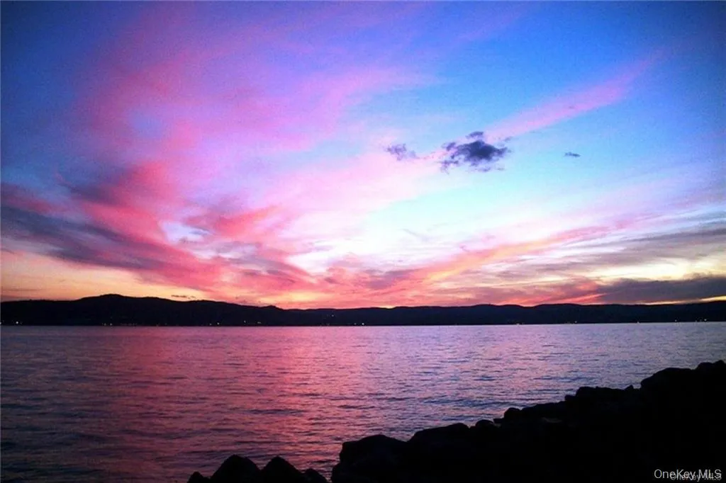 A beautiful sunset over the marina creating a serene waterfront scene. A beautiful sunset over the marina creating a serene waterfront scene.