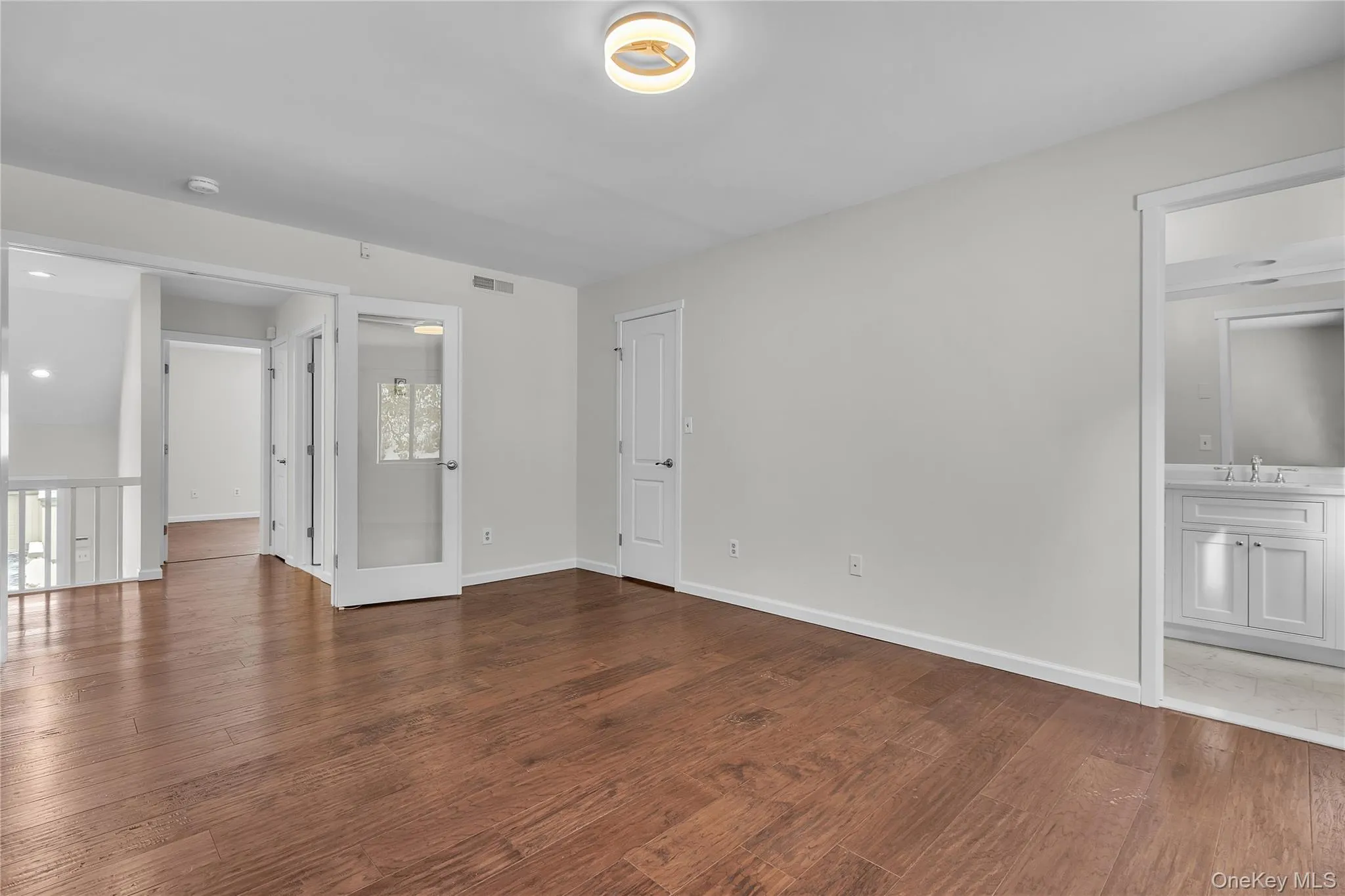 Double door entry into primary bedroom. Double door entry into primary bedroom.