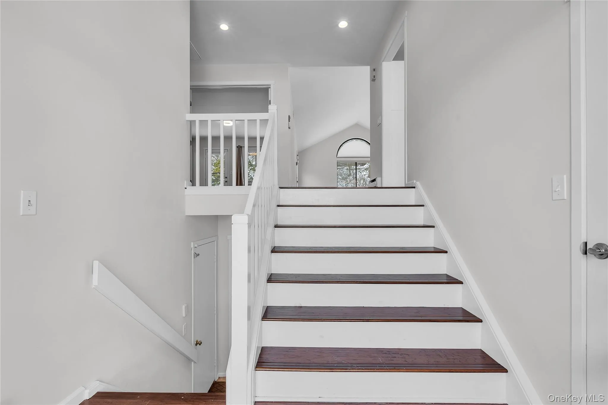 Stairs leading to main floor. Stairs leading to main floor.