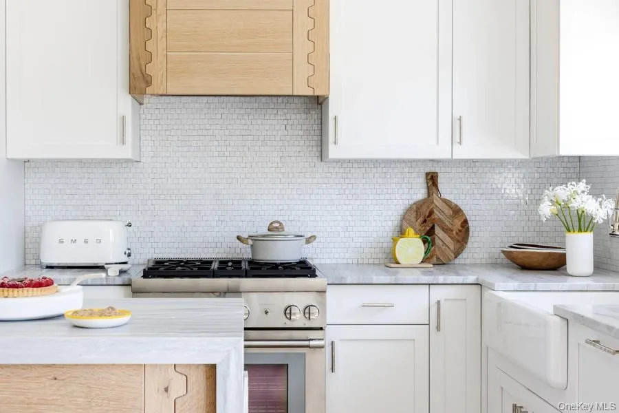 Open Gourmet Kitchen With Marble Countertops Open Gourmet Kitchen With Marble Countertops