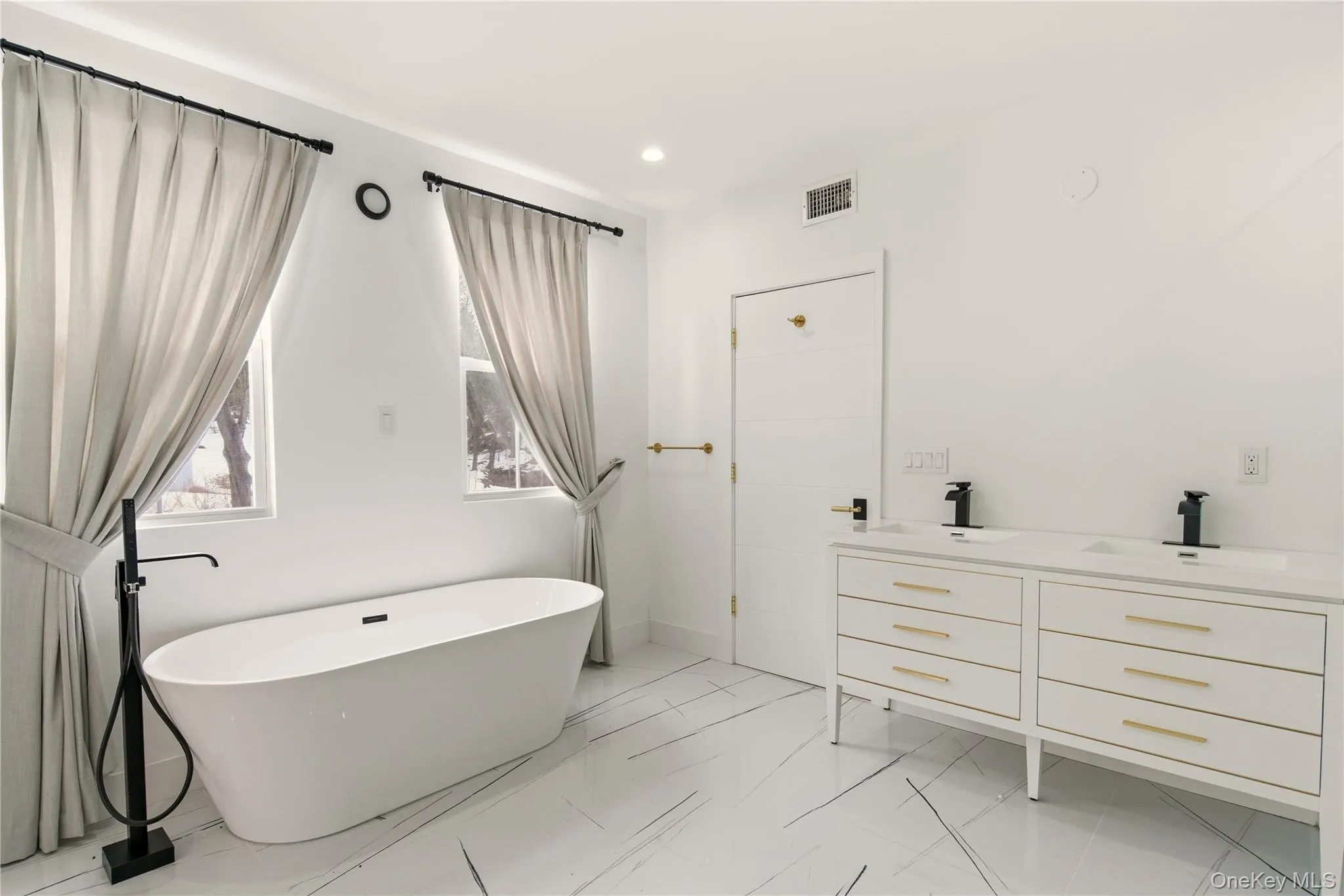 Master Bathroom with Double Vanity and Soaking Tub. Master Bathroom with Double Vanity and Soaking Tub.