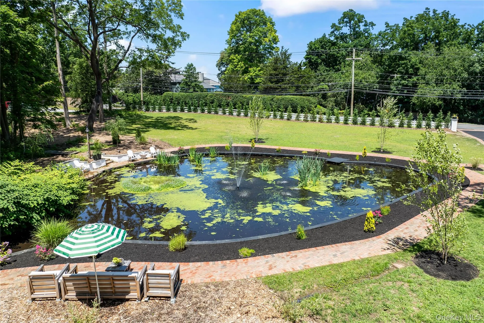 Natural Stream-Fed Pond with Fountain. Natural Stream-Fed Pond with Fountain.