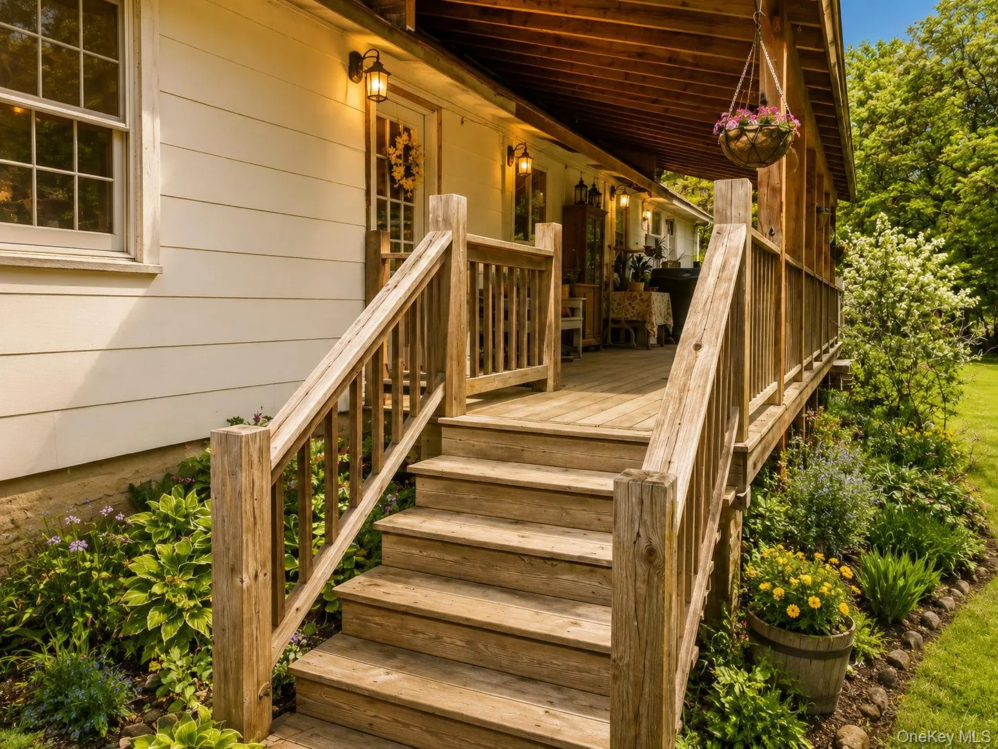 Expansive wood-finish deck with stairs and railing Expansive wood-finish deck with stairs and railing